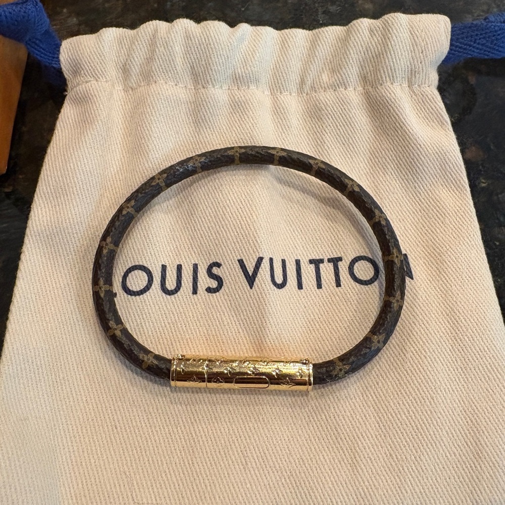 Louis Vuitton Confidential Bracelet with Gold Detailing Retails $300